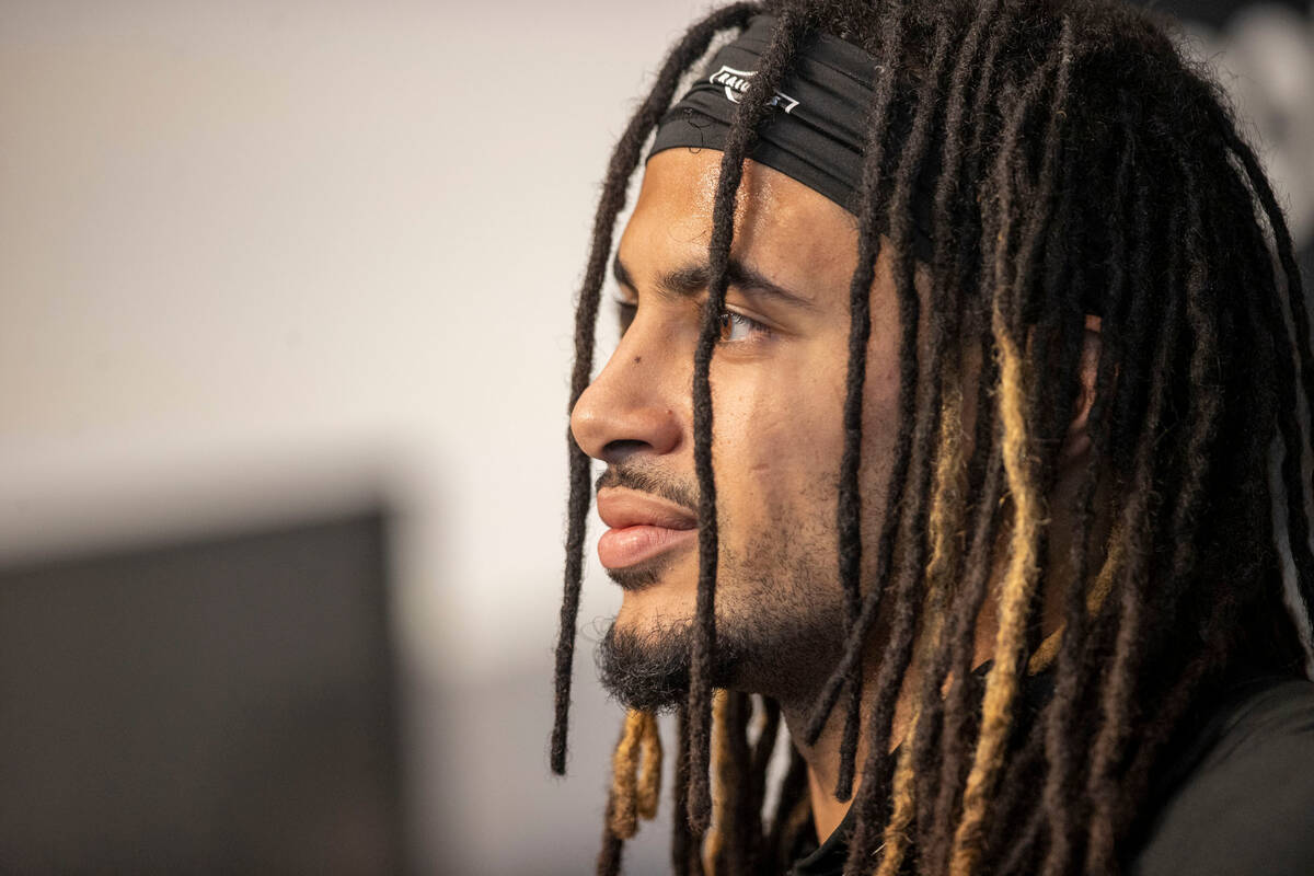 Raiders safety Tre'von Moehrig (25) attends a news conference during the team’s mandator ...
