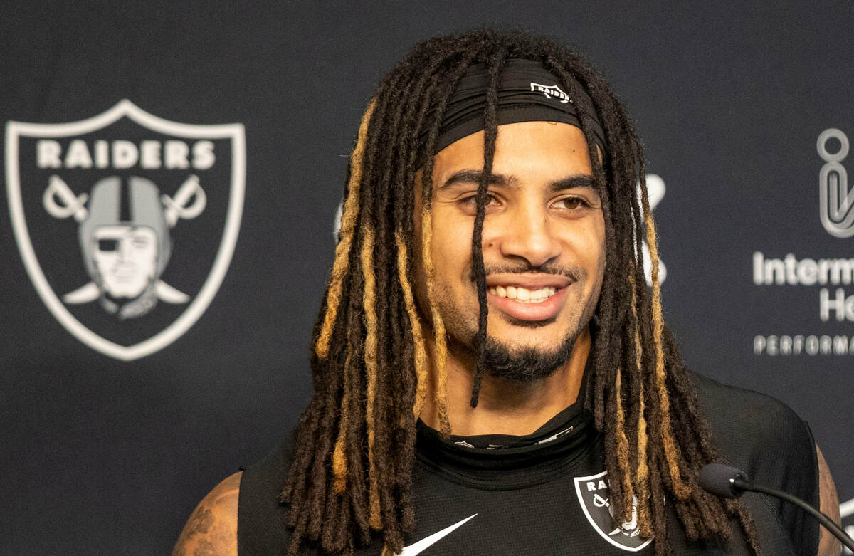 Raiders safety Tre'von Moehrig (25) smiles at a news conference during the team’s mandat ...