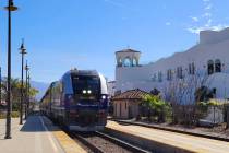 Pacific Surfliner arriving at Santa Barbara station to pick up San Luis Obispo-bound passengers ...