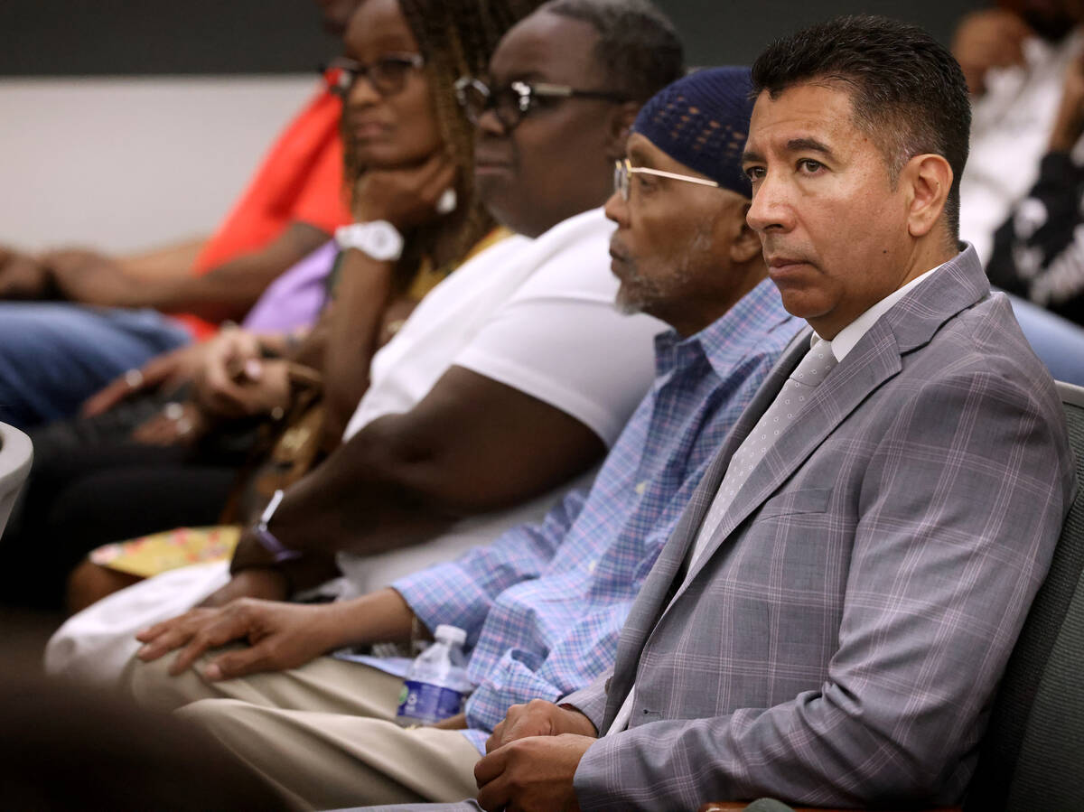 Former Alpine Motel Apartments owner Adolfo Orozco-Garcia, right, waits to appear in Clark Coun ...