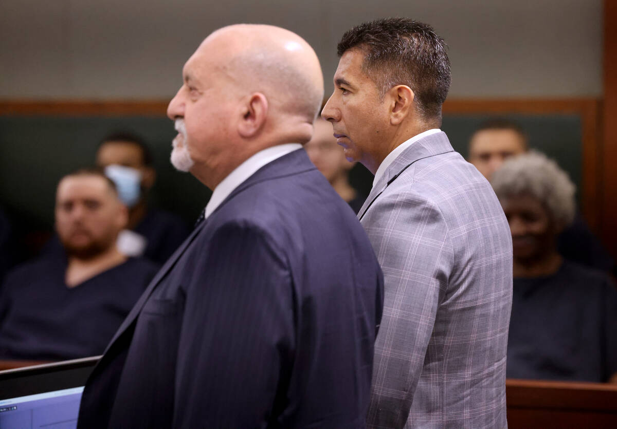 Former Alpine Motel Apartments owner Adolfo Orozco-Garcia, right, appears in Clark County Distr ...