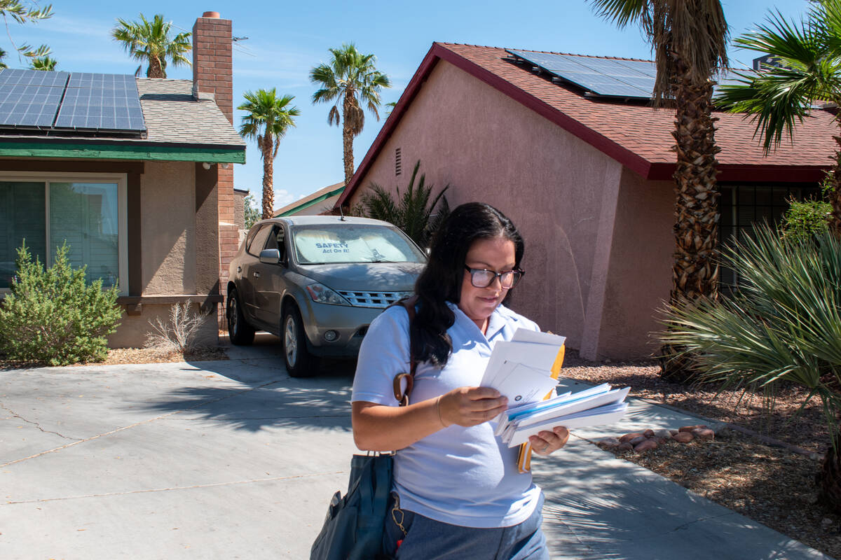 Postal worker Candice Smith, a Las Vegas mail carrier for four years, says she carries dog spra ...