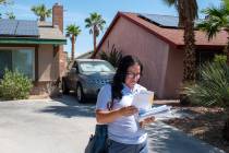 Postal worker Candice Smith, a Las Vegas mail carrier for four years, says she carries dog spra ...