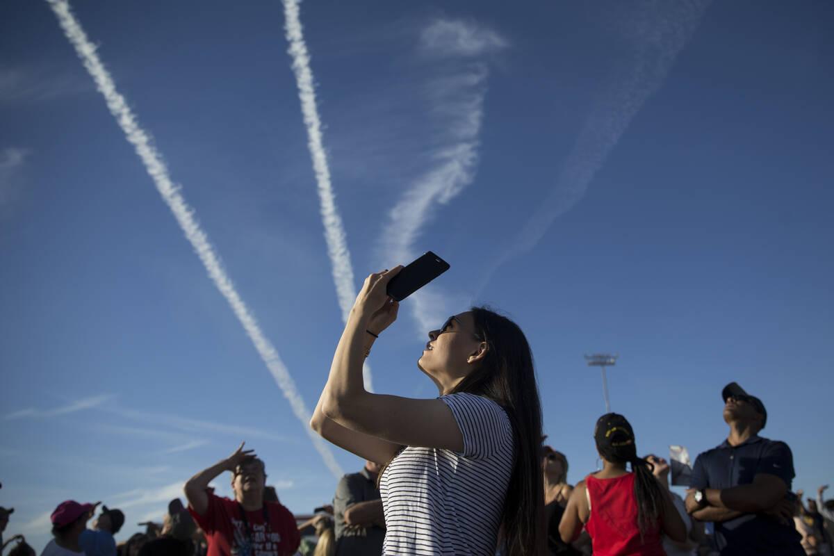 Gina Gross of Las Vegas watches the Thunderbirds perform during Aviation Nation at Nellis Air F ...