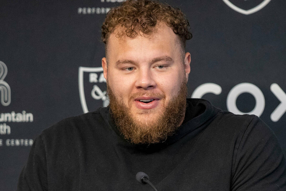 Raiders center Andre James takes questions at a news conference during the team’s mandat ...