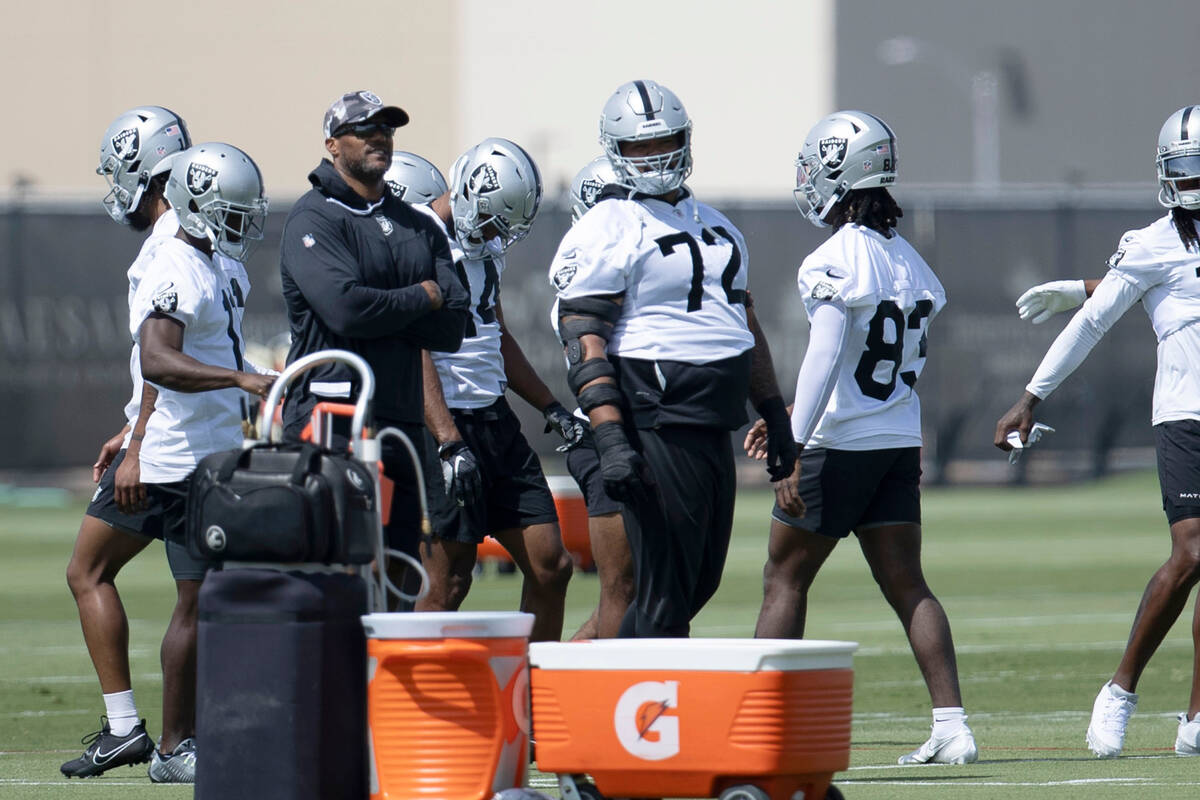 Raiders guard Jermaine Eluemunor (72) stretches during the Raiders’ organized team activ ...