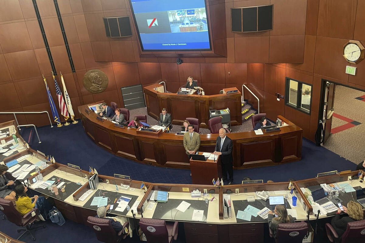 Lawmakers sit at their desks in the Nevada state Senate chambers on Wednesday, June 7, 2023, in ...