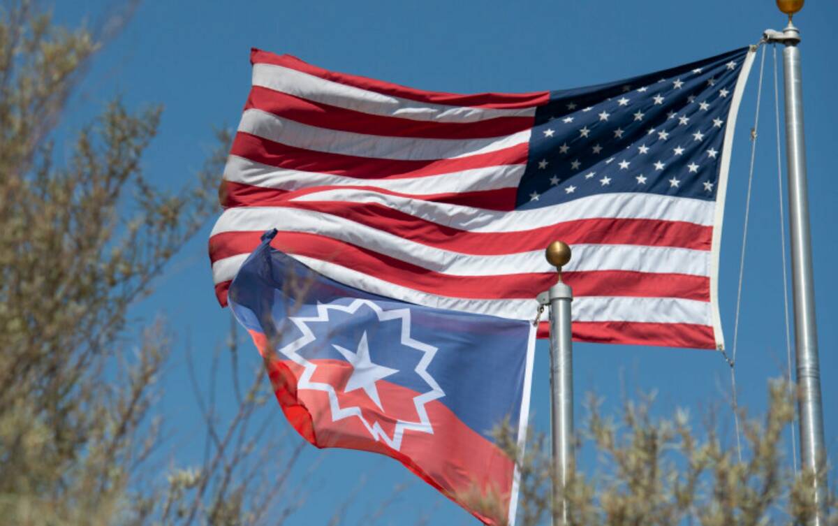 The American flag and the Juneteenth flag are seen outside the North Las Vegas City Hall in Jun ...