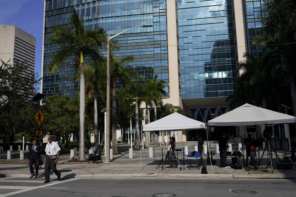 News media are set up outside of the Wilkie D. Ferguson Jr. U.S. Courthouse where a grand jury ...
