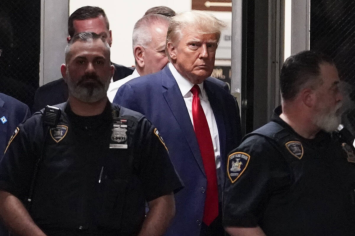Former President Donald Trump arrives at court, Tuesday, April 4, 2023, in New York. Trump is s ...