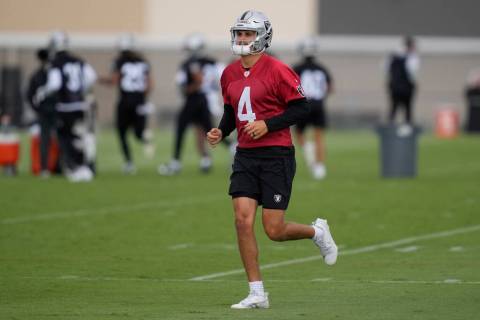 Las Vegas Raiders quarterback Aidan O'Connell participates during an NFL football practice at t ...