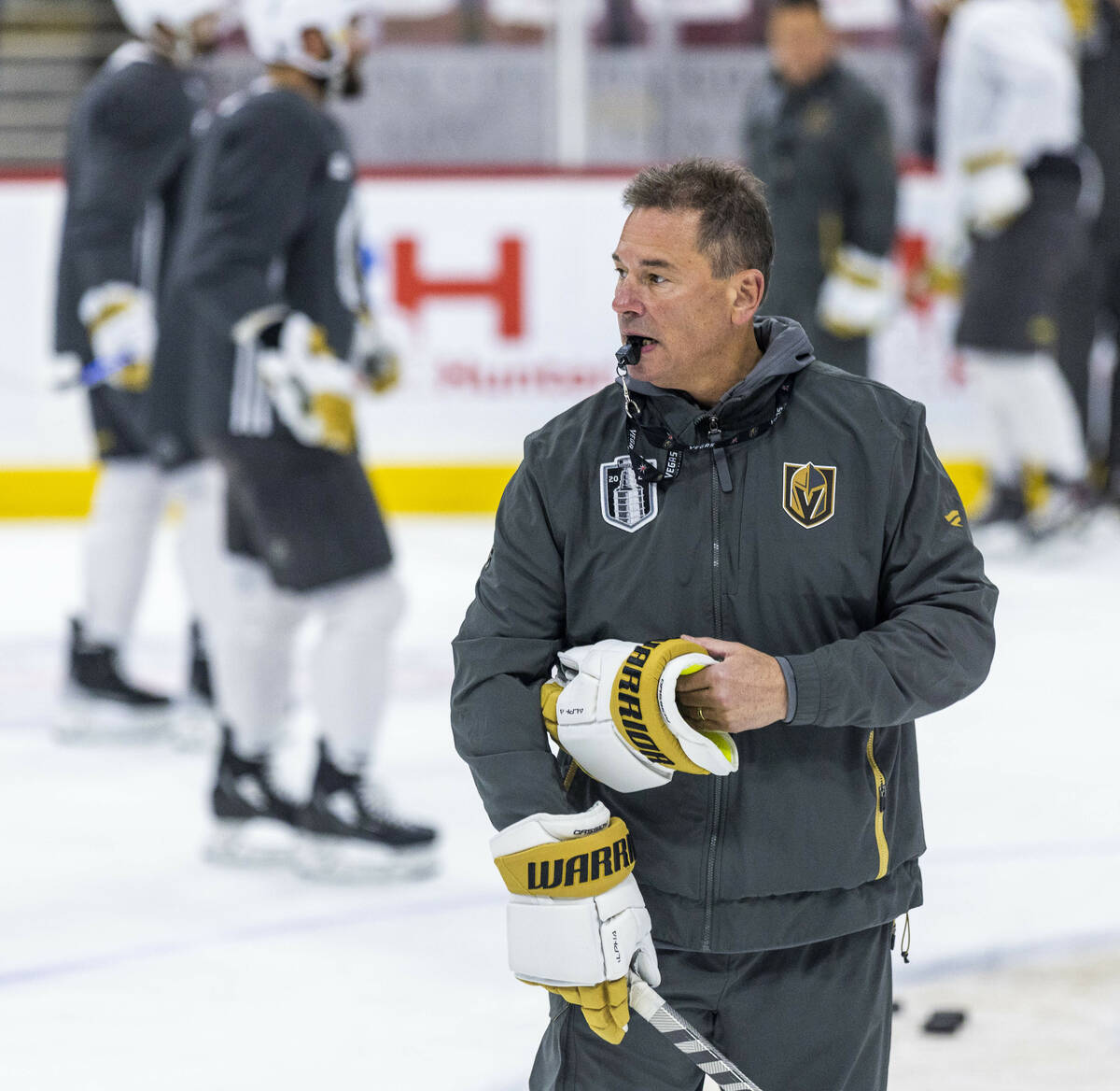 Golden Knights head coach Bruce Cassidy watches his players practice during the morning skate b ...