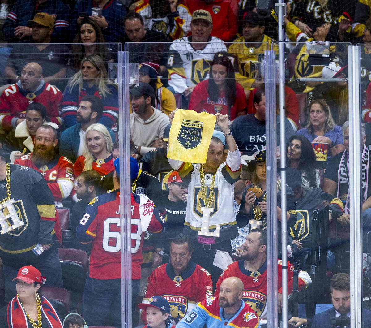 Golden Knights fans celebrate their first goal against the Florida Panthers in period one of Ga ...