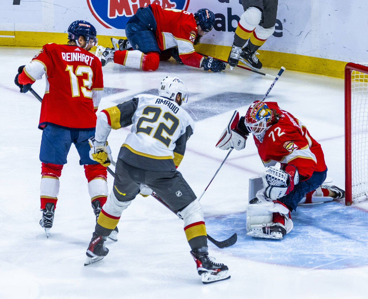 Florida Panthers goaltender Sergei Bobrovsky (72) deflects a shot by Golden Knights right wing ...
