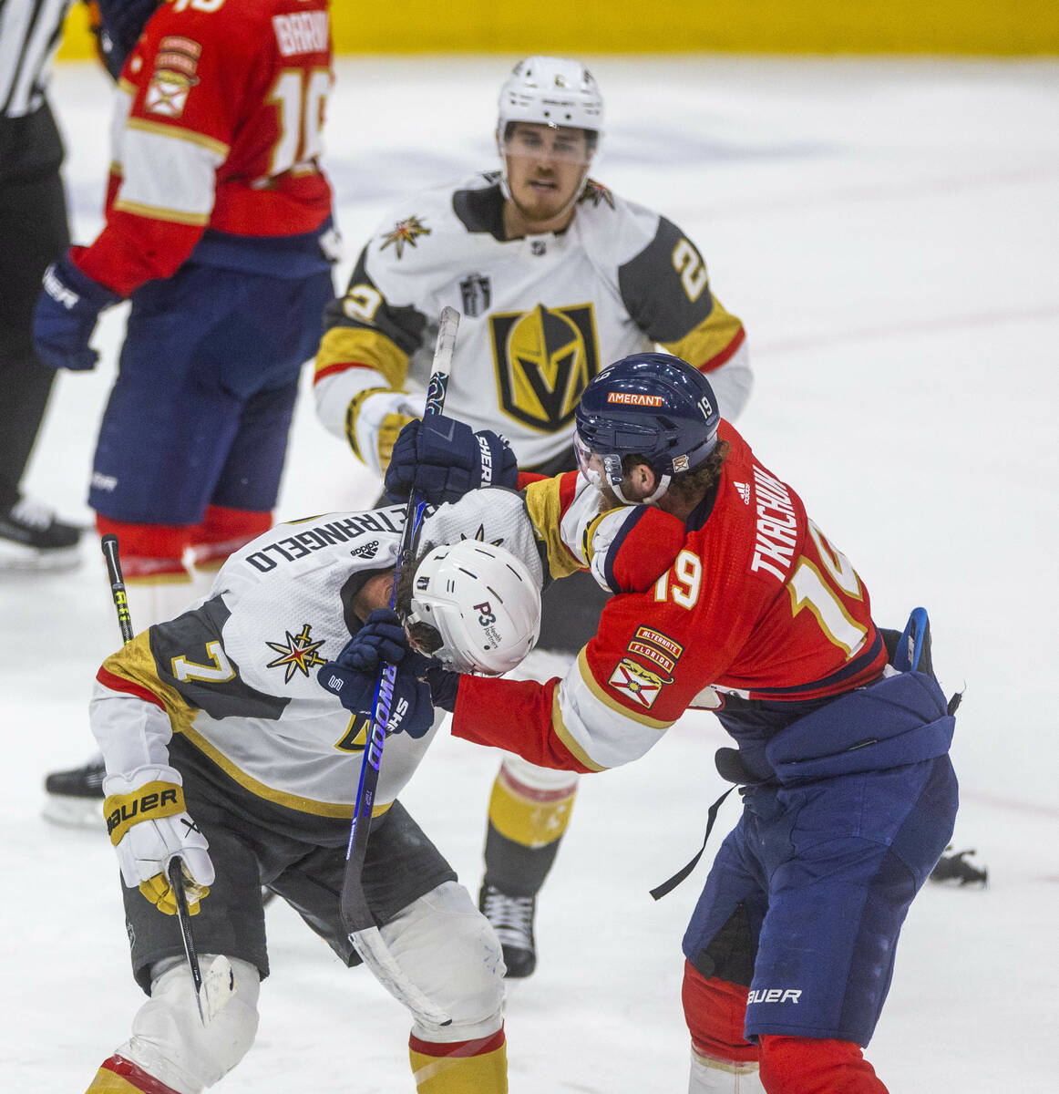 Golden Knights defenseman Alex Pietrangelo (7) gets a stick to the back of the neck from Florid ...