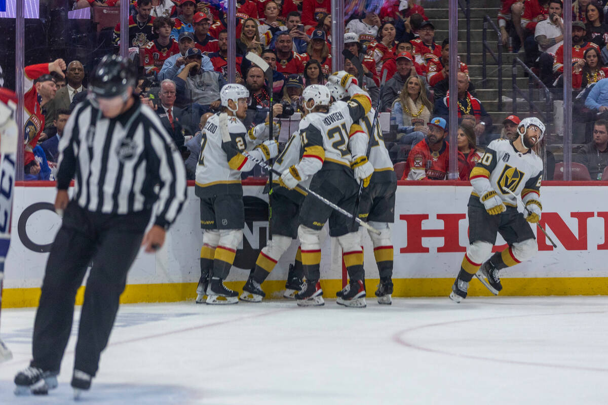 Golden Knights players celebrate a goal against the Florida Panthers in period 2 of Game 4 of t ...