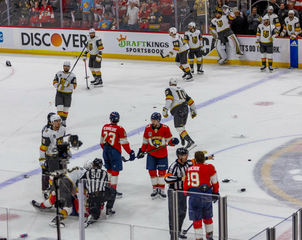 Fighting is nearly broken up between Golden Knights and Florida Panthers players as rats are to ...