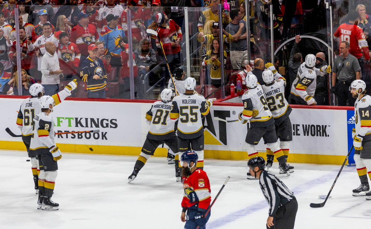 Golden Knights players look not avoid rats and bottles being thrown down to the ice by fans aft ...