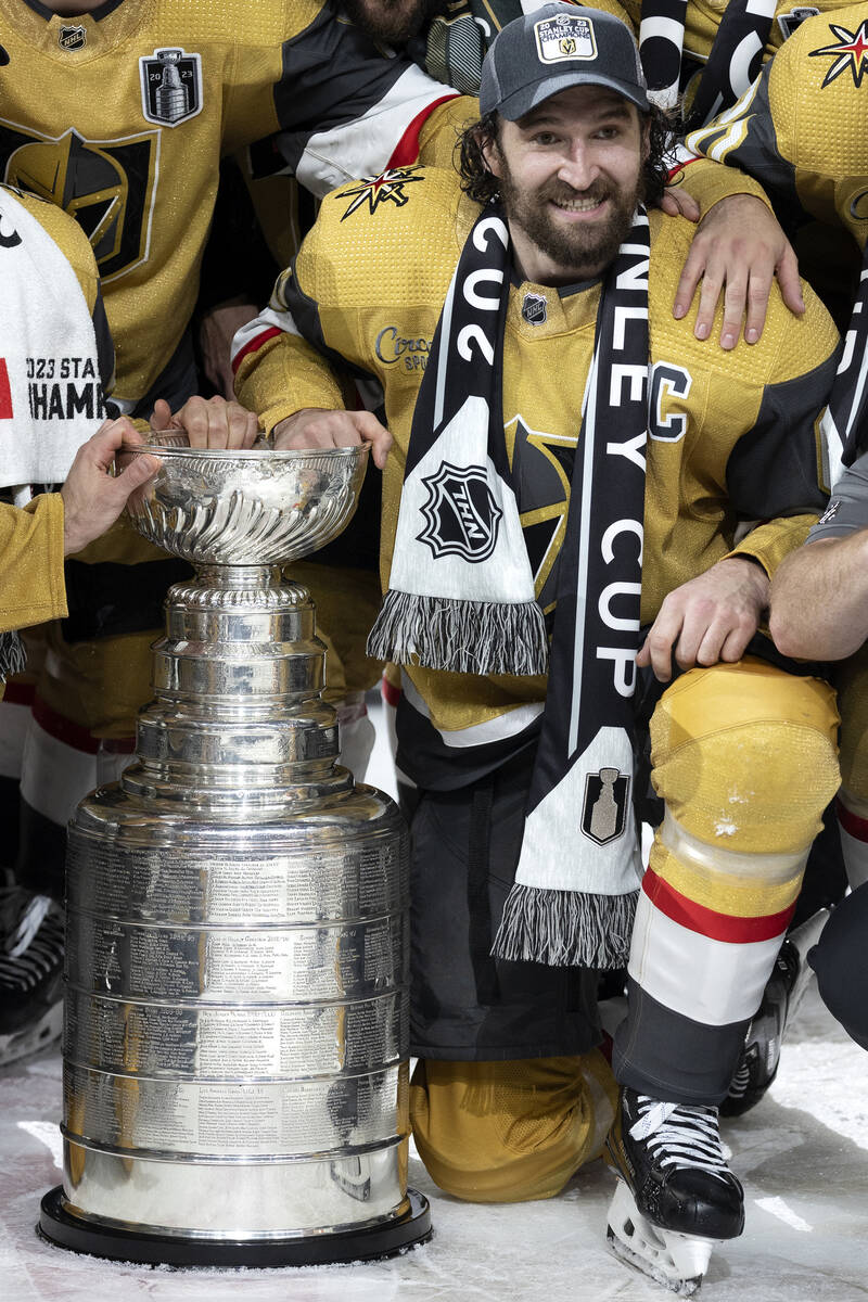 Golden Knights right wing and captain Mark Stone poses with the Stanley Cup after winning Game ...