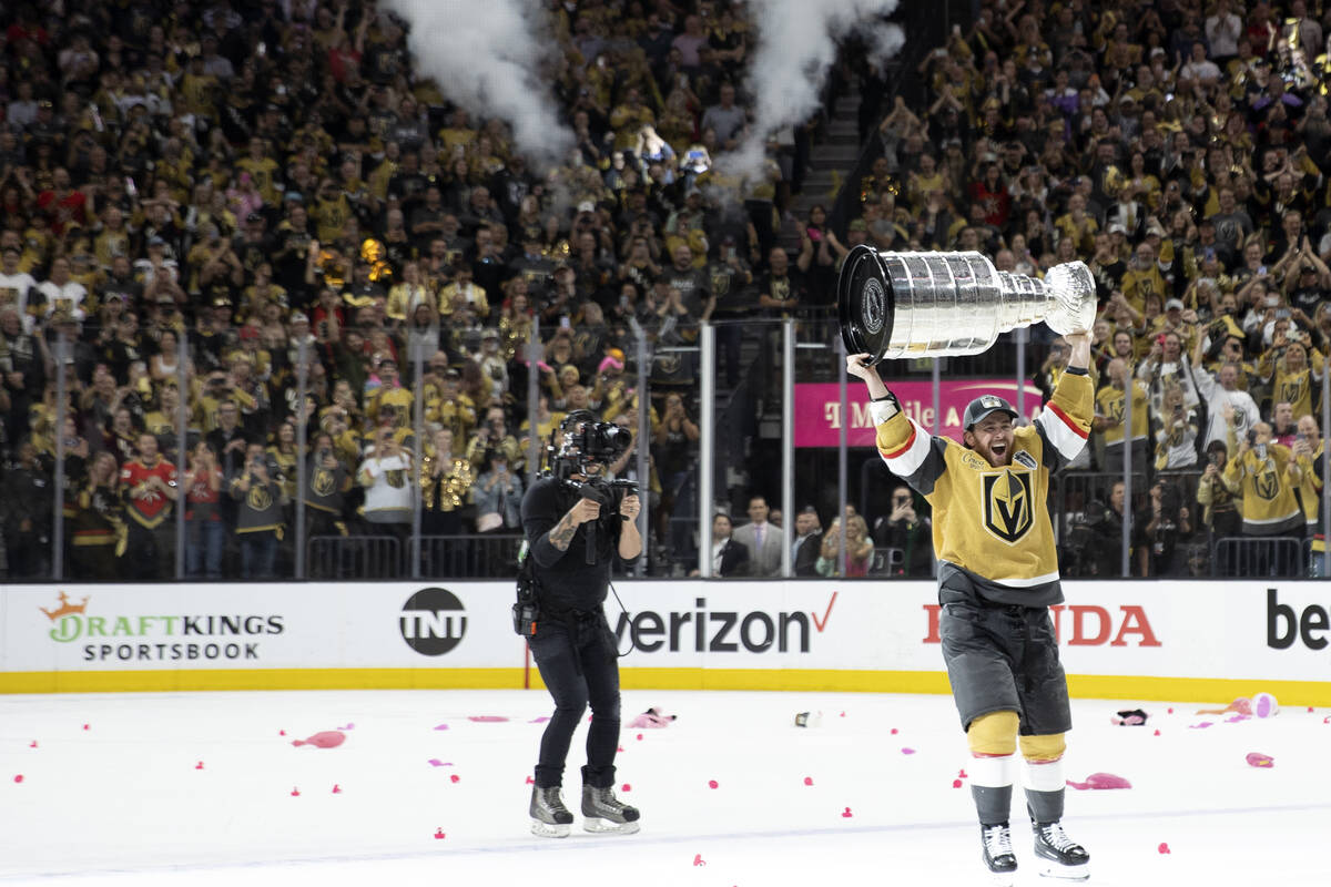 Golden Knights right wing Jonathan Marchessault celebrates with the Stanley Cup after his team ...