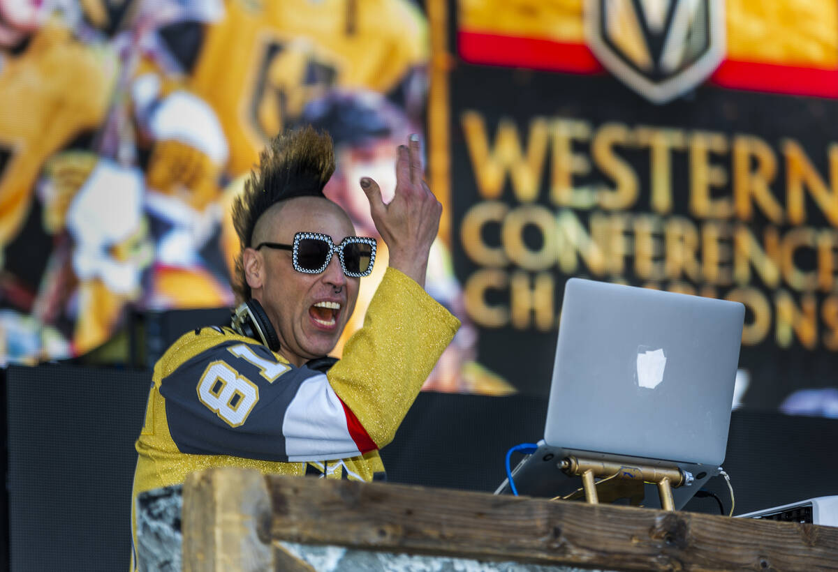 Golden Knights DJ Michael Toast gets the fans pumped up outside before Game 5 of the NHL hockey ...