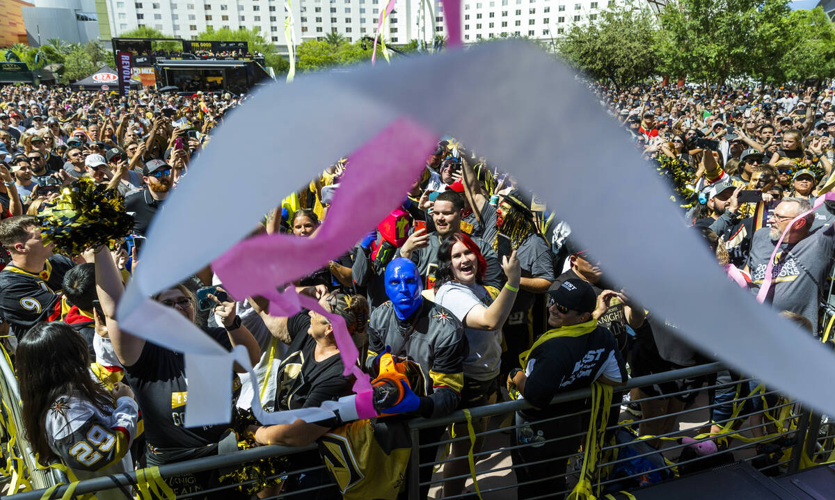 The Blue Man Group shoot streamers about the Golden Knights fans enjoying the music outside bef ...