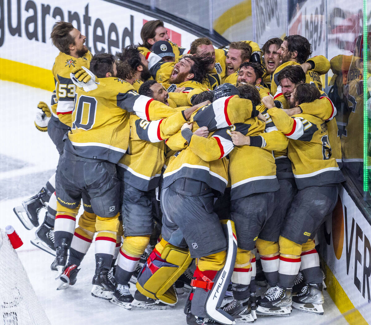 The Golden Knights players celebrate their 9-3 win over the Florida Panthers following Game 5 w ...