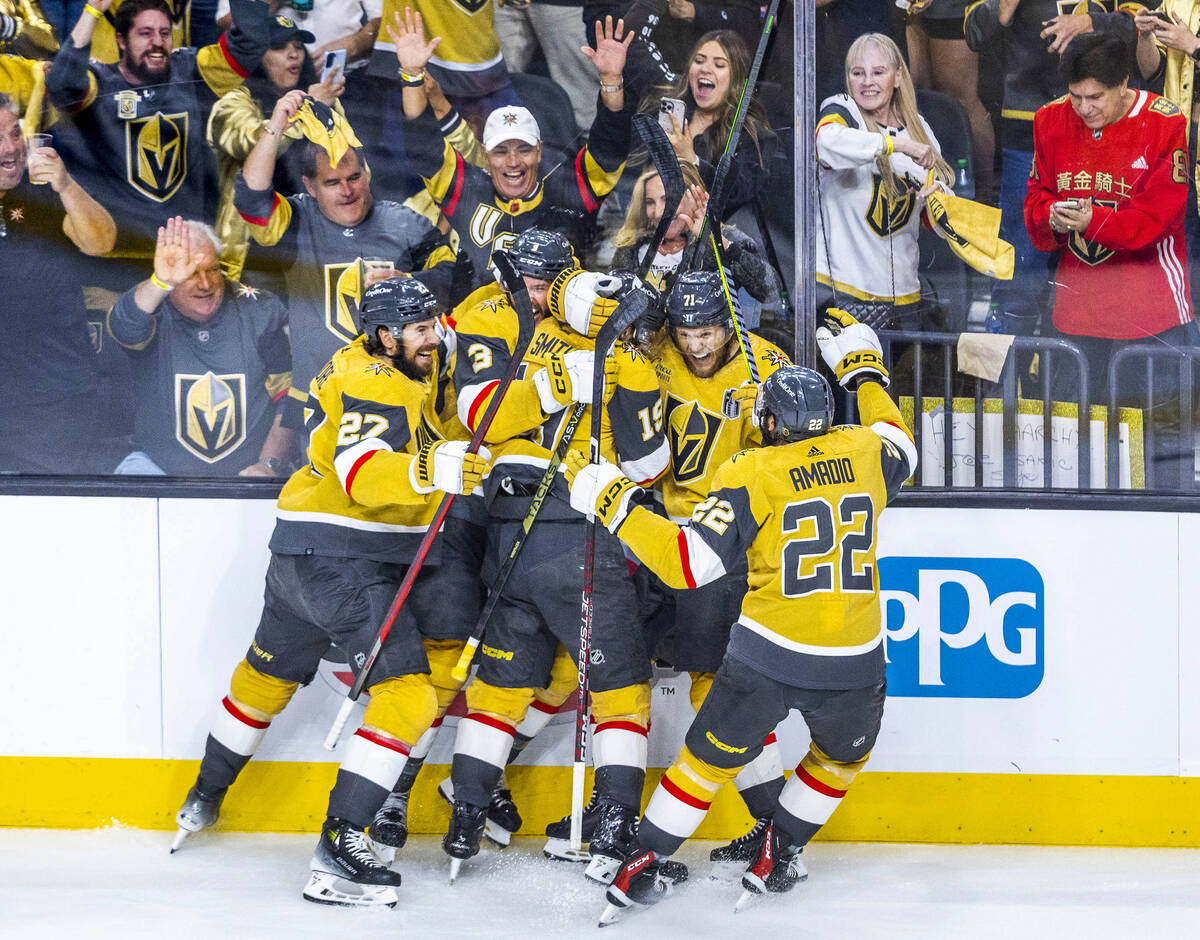 Golden Knights center William Karlsson (71) and teammates celebrate a goal against Florida Pant ...