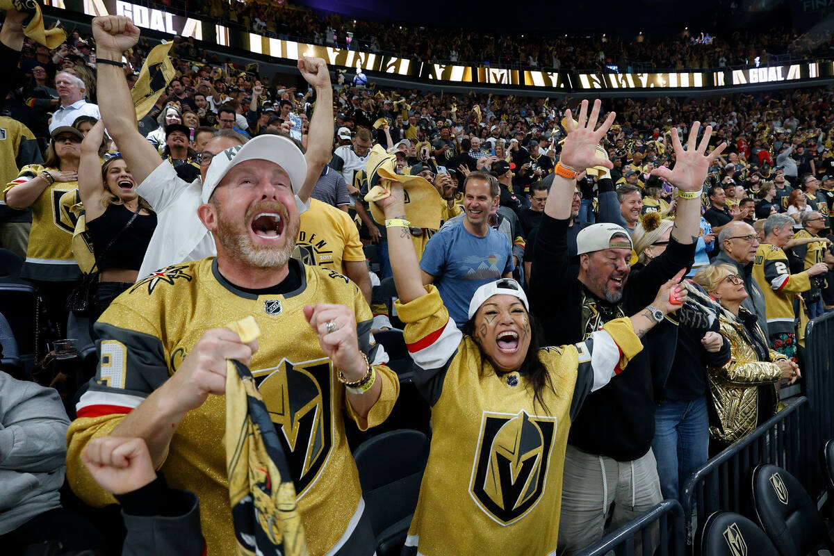 Golden Knights fans celebrate after Golden Knights right wing Mark Stone (61) scored a goal dur ...