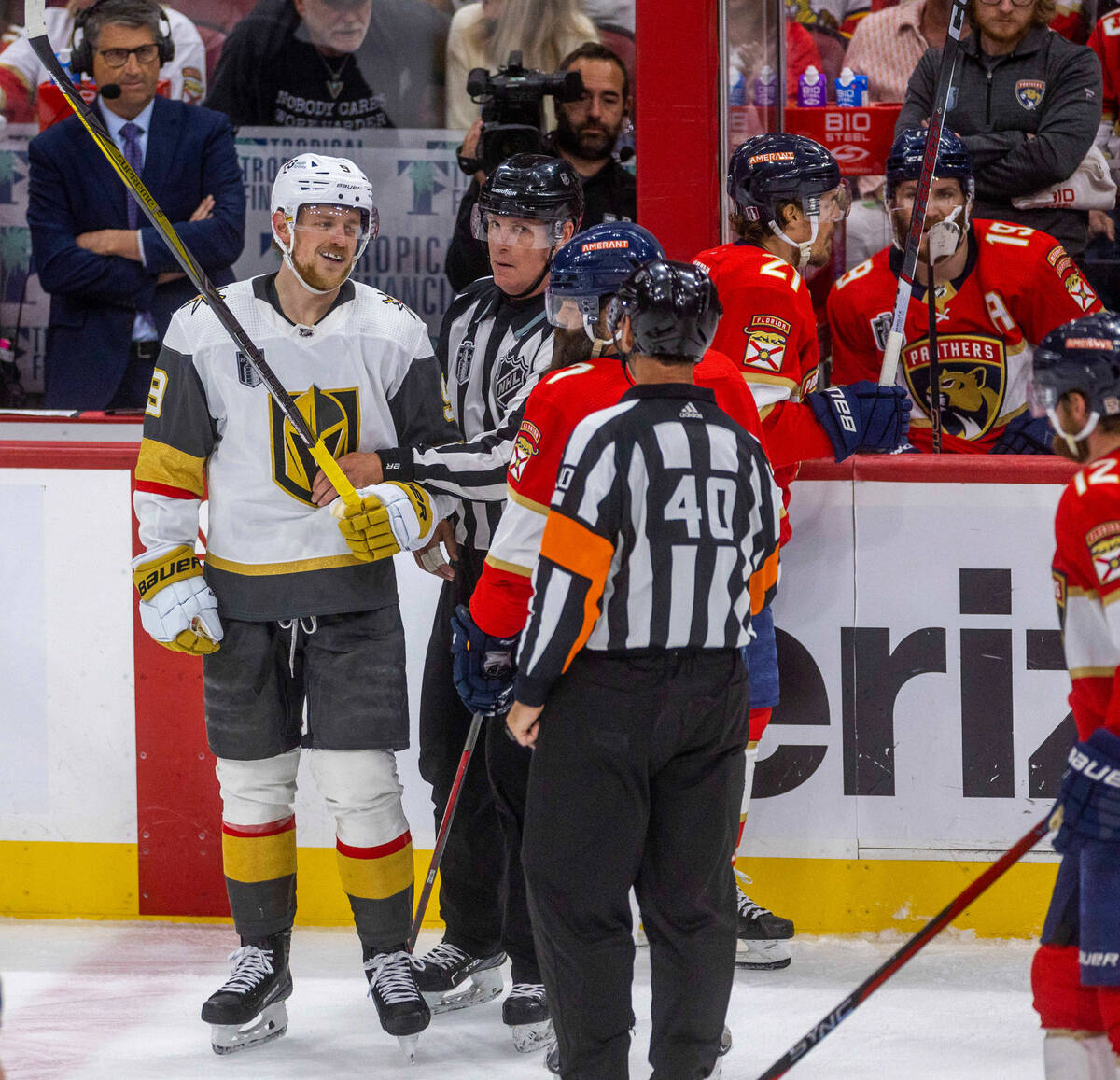 Golden Knights center Jack Eichel (9) is upset about a hit in the back by Florida Panthers defe ...