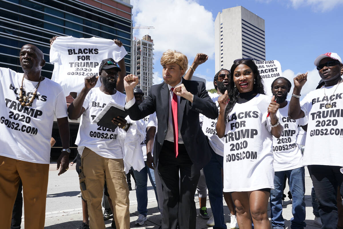 Supporters of former President Donald Trump rally outside the Wilkie D. Ferguson Jr. U.S. Court ...