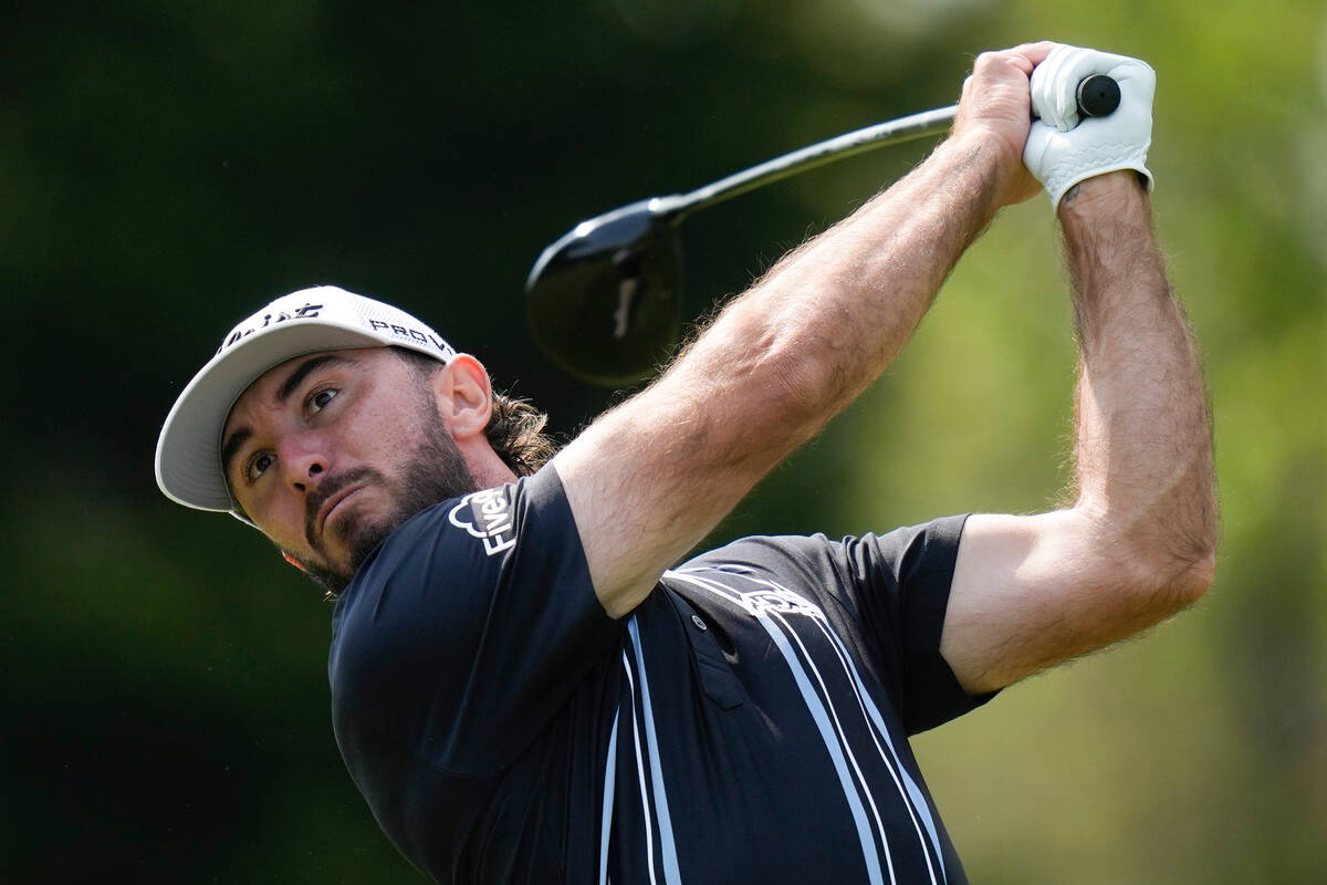 Max Homa watches his tee shot on the 17th hole during the second round of the PGA Championship ...