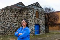 Owyhee Combined School Assistant Principal Lynn Manning John stands outside the old gym within ...