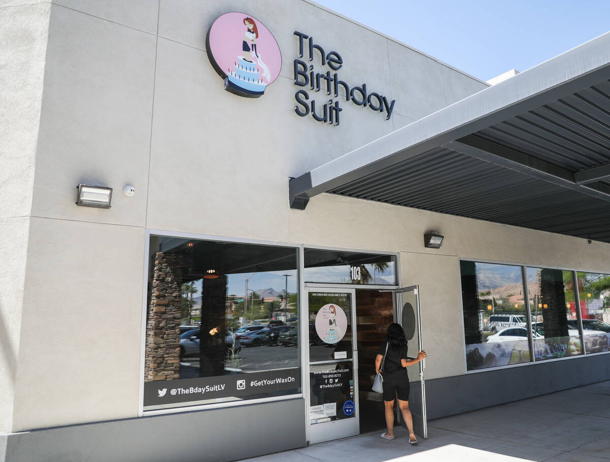 A customer enters The Birthday Suit, a waxing spa, on Wednesday, June 14, 2023, in Las Vegas. ( ...