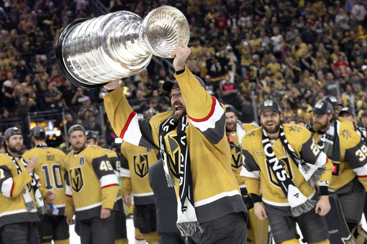 Stanley Cup keeper Phil Pritchard helps Golden Knights celebrate