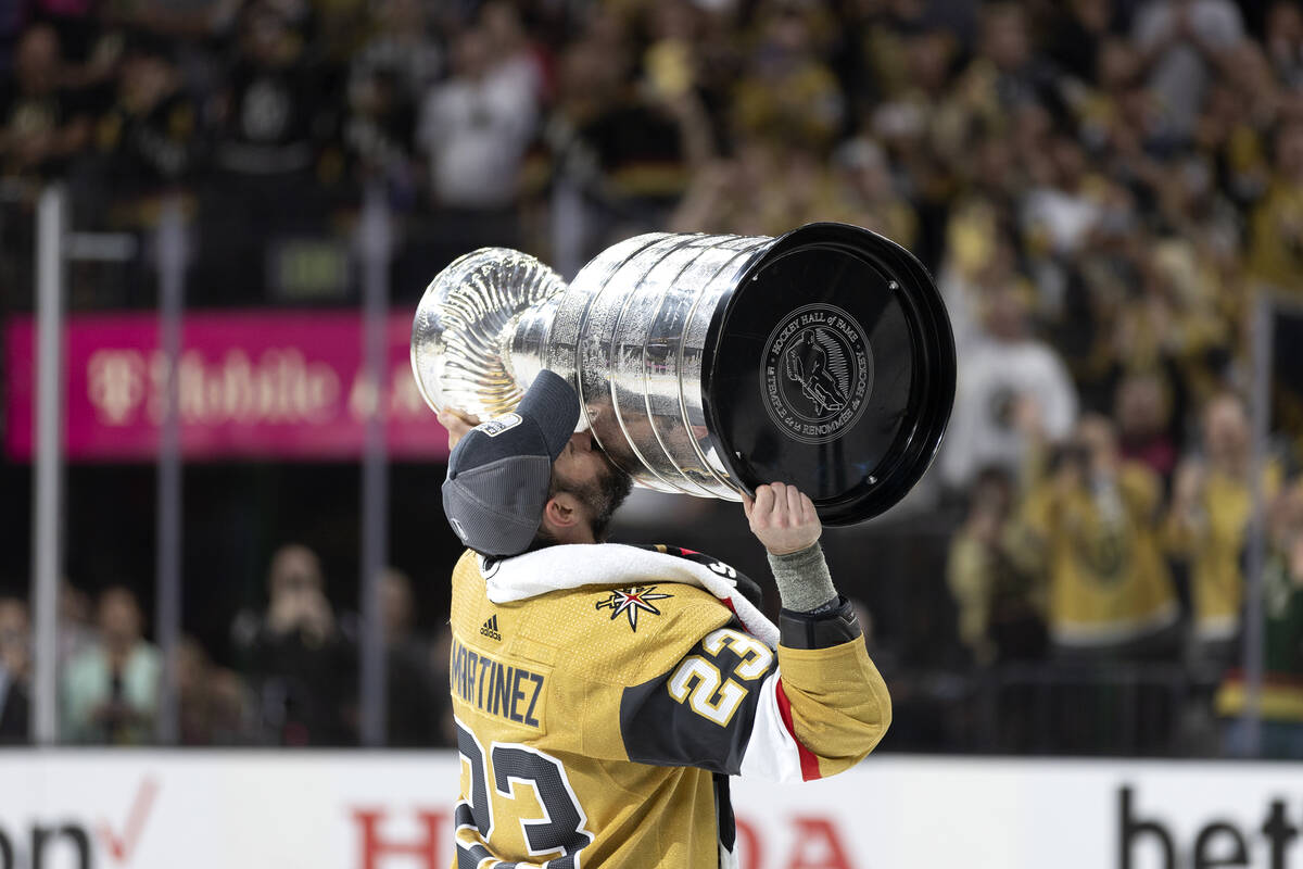 Golden Knights players celebrate with the Stanley Cup trophy — PHOTOS, Golden Knights