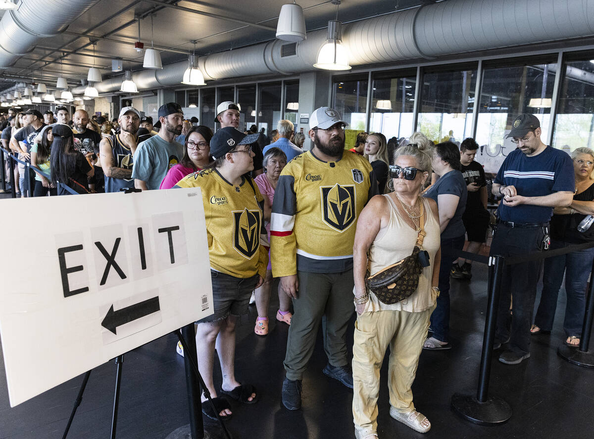 Golden Knights fans line up to buy Stanley Cup championship merchandise at The Arsenal at City ...