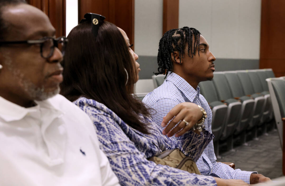 Former UNLV basketball recruit Zaon Collins, right, waits to appear in court at the Regional Ju ...