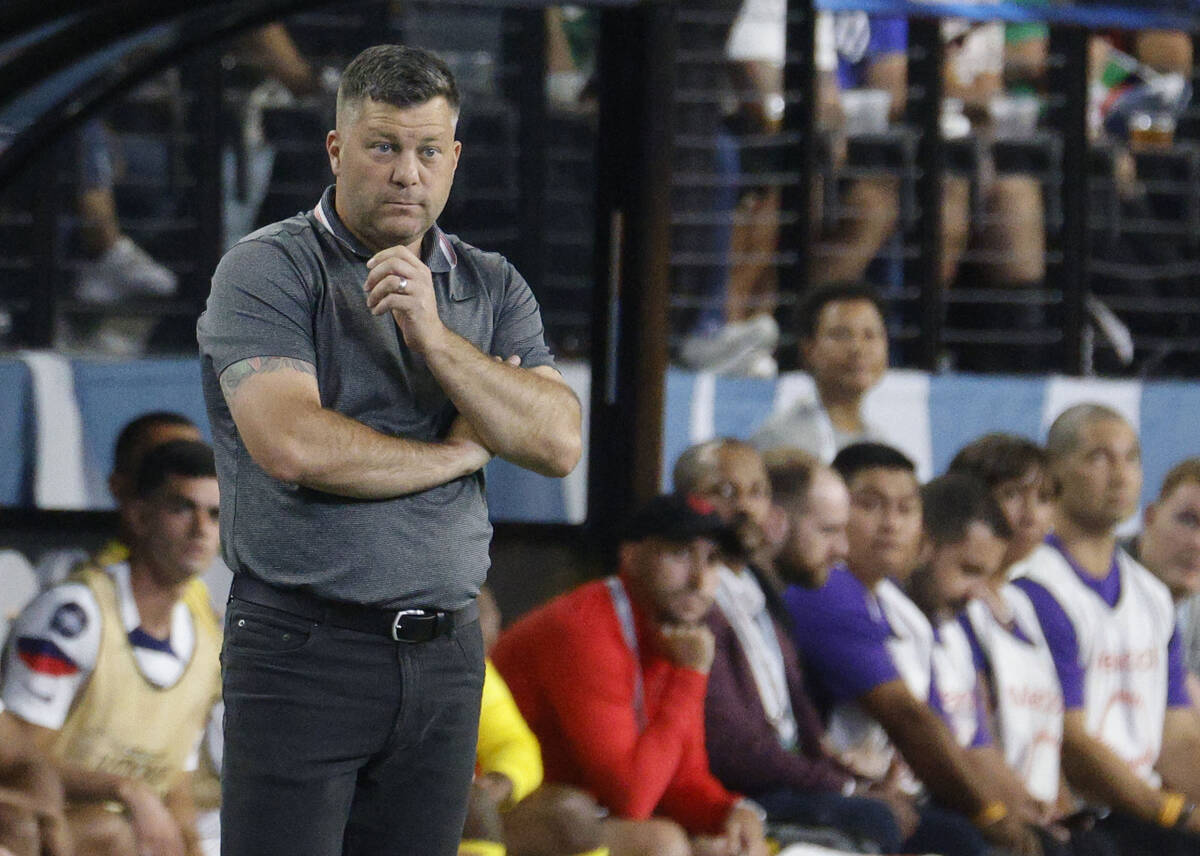 USA interim coach B.J. Callaghan watches his players during the second half of a CONCACAF Natio ...