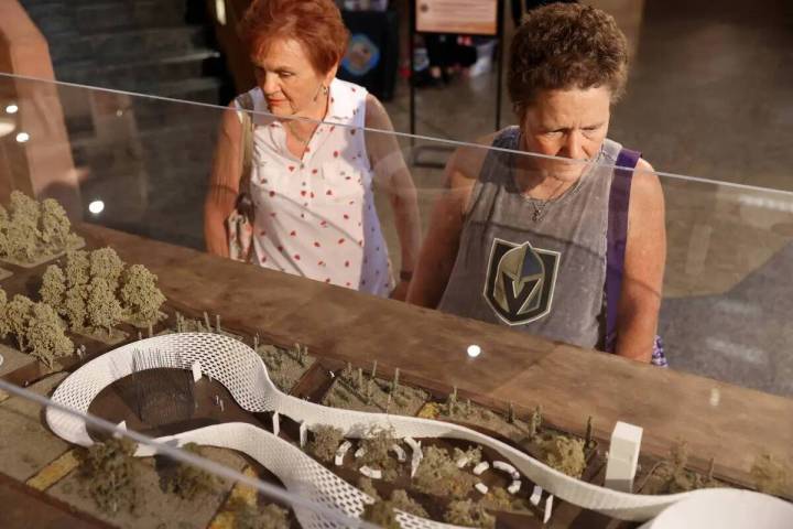 Marilyn Posster, left, and her daughter Pamela Posster, both of Las Vegas, check out a model by ...