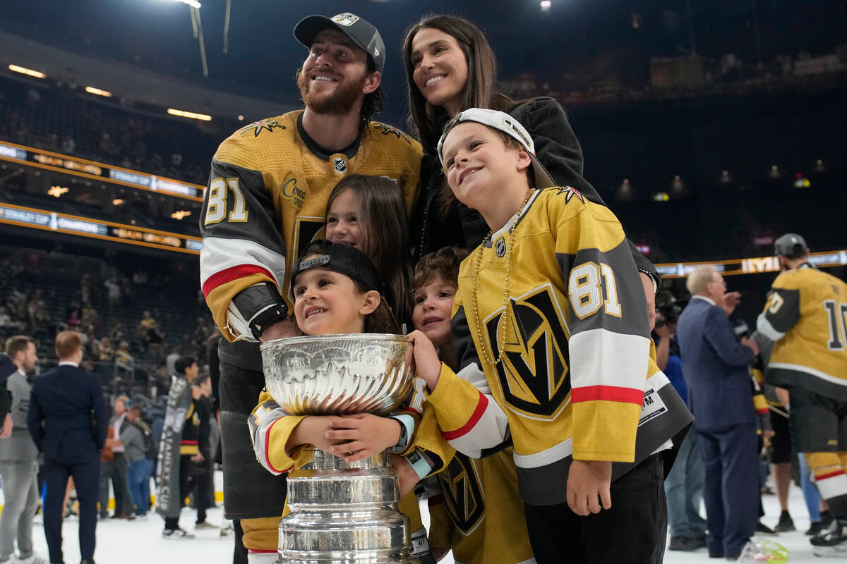 Vegas Golden Knights right wing Jonathan Marchessault (81) poses with family beside the Stanley ...