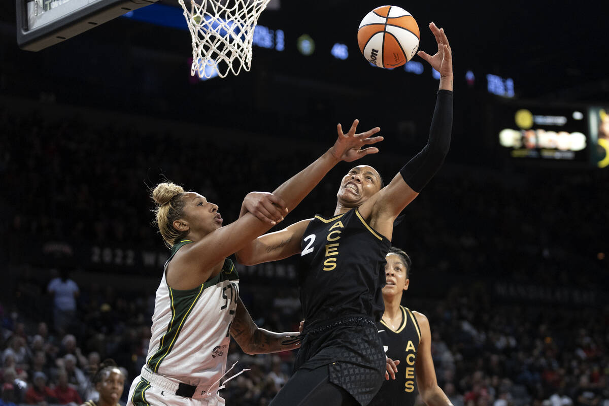 Las Vegas Aces forward A'ja Wilson (22) jumps for a rebound against Seattle Storm center Merced ...