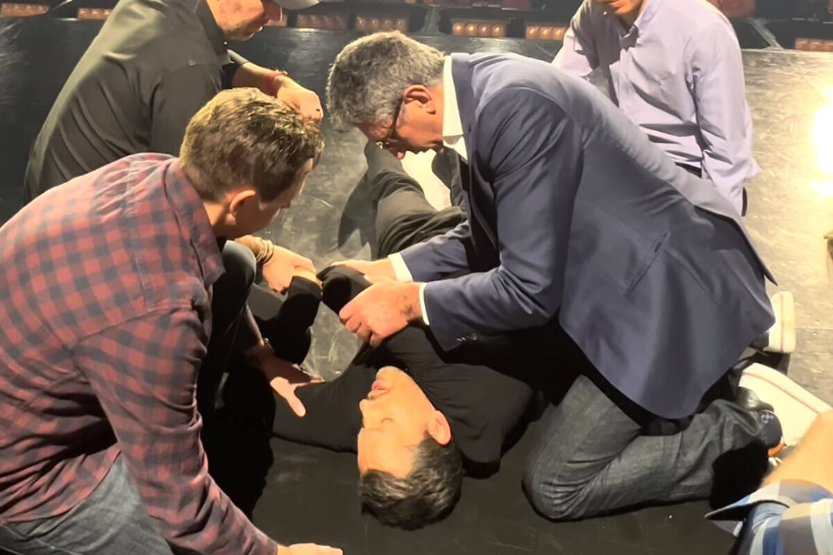 David Blaine is treated onstage at Resorts World Theatre after suffering a separated shoulder i ...