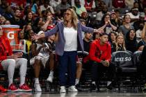 Las Vegas Aces head coach Becky Hammon reacts during a WNBA basketball game against the Atlanta ...