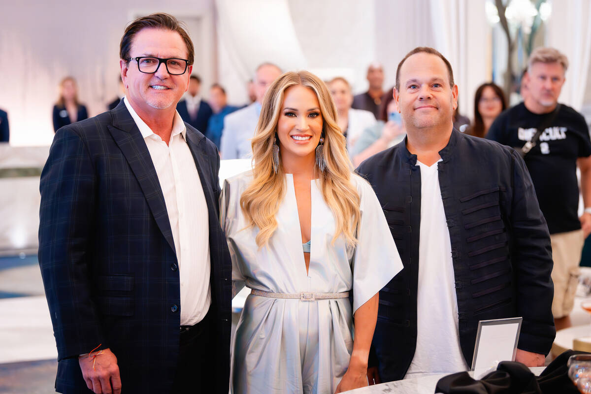 Resorts World President Scott Sibella, country superstar Carrie Underwood and AEG Presents exec ...
