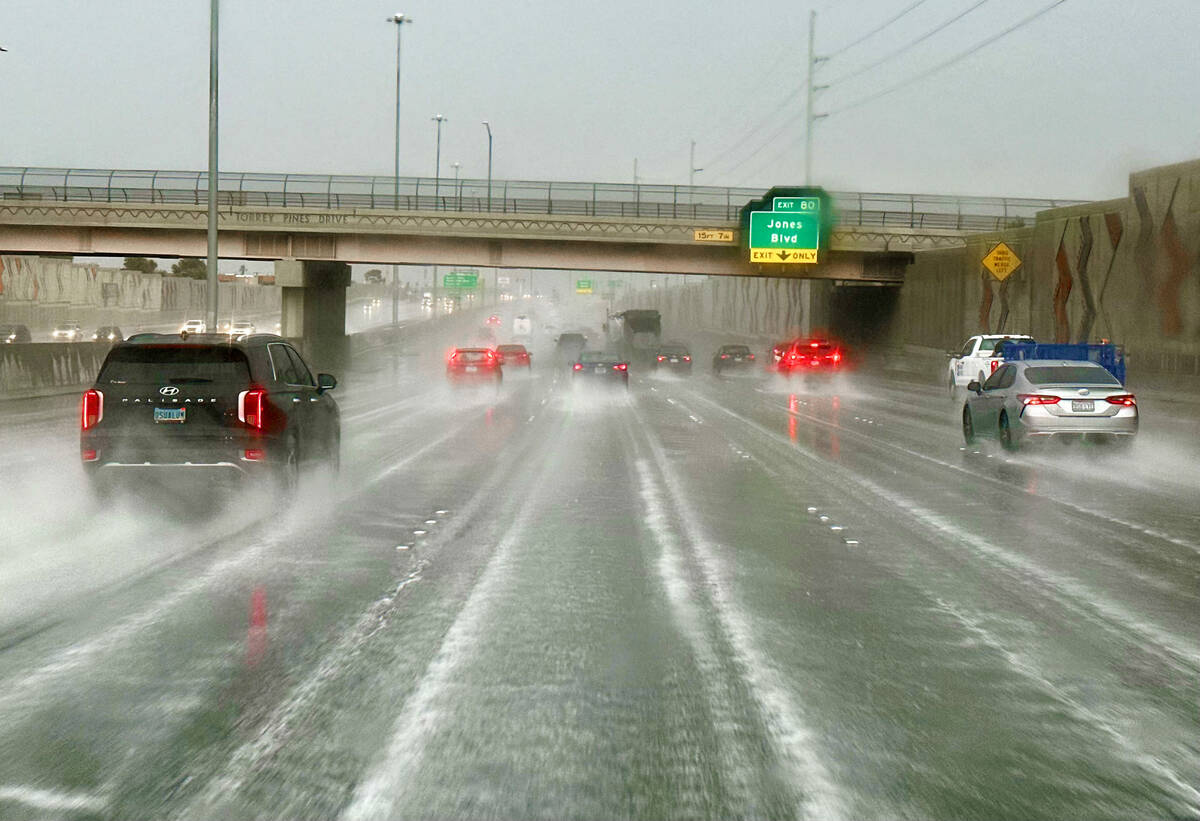 Traffic navigates heavy rain on U.S. Route 95 on Friday, June 16, 2023, in Las Vegas. (LE Basko ...