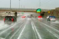 Traffic navigates heavy rain on U.S. Route 95 on Friday, June 16, 2023, in Las Vegas. (LE Basko ...