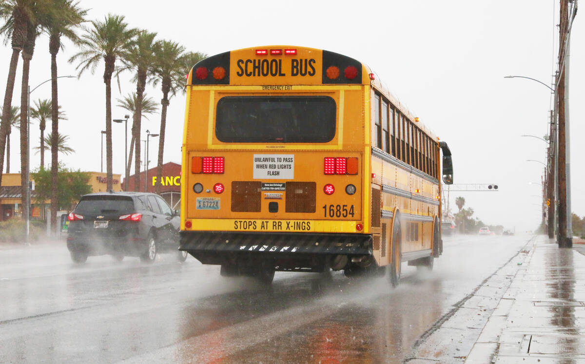 Cars and buses drive along Eastern avenue during an early morning rain storm on Friday, June 16 ...
