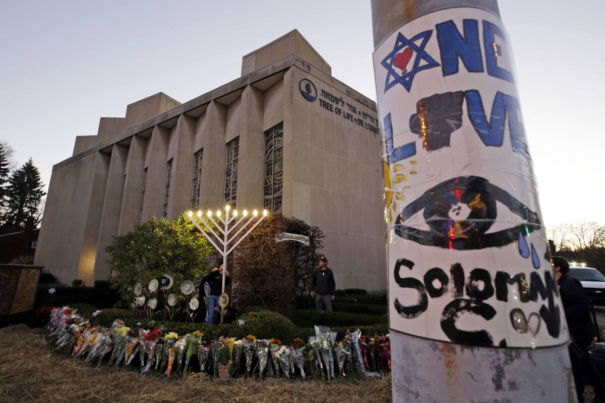 A menorah is tested outside the Tree of Life Synagogue in preparation for a celebration service ...