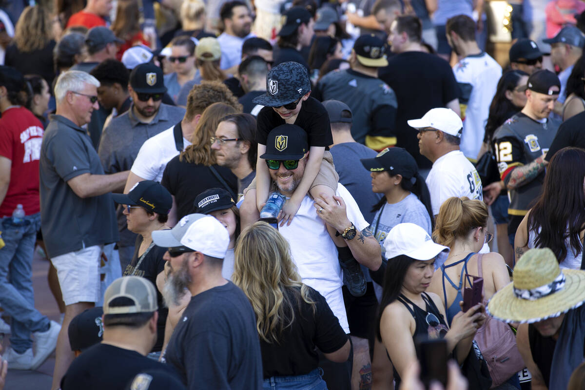Fans crowd Toshiba Plaza before the Golden Knights parade down the Las Vegas Strip to celebrate ...